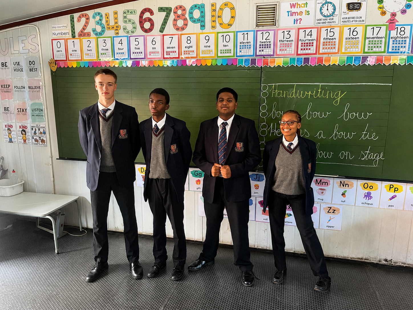 Nikolas Roos, Jenovic Lumu, Navmith Vandanapu and Lerato Molobye at Berea Primary School